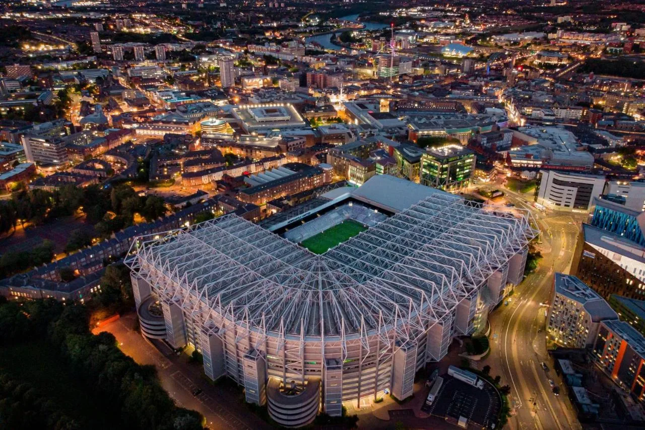 Aerial night view of St James' Park stadium near The County Hotel Newcastle