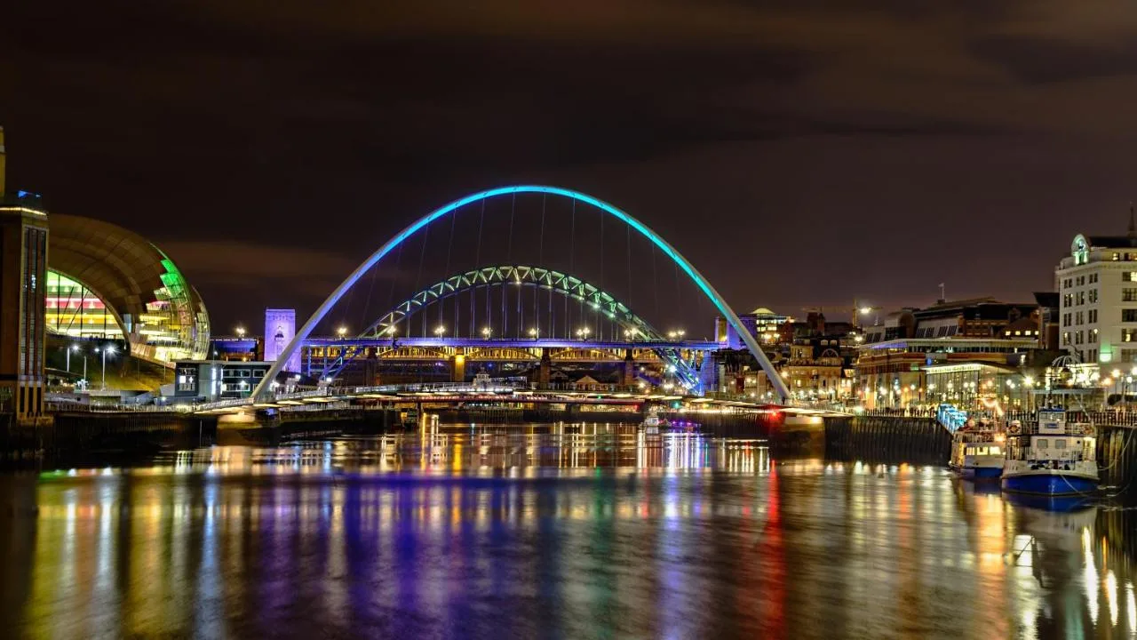 The Tyne Bridge illuminated at night, a short walk from The County Hotel Newcastle